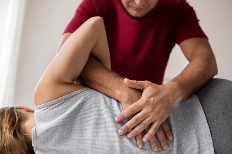 Manipulation ostéopathique sur les lombaires